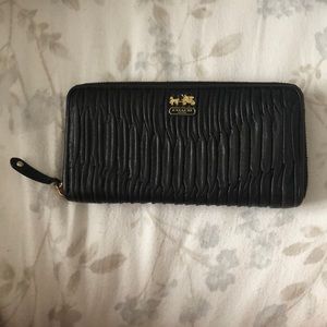 Soft leather Coach wallet in wonderful condition. Fits everything you need!